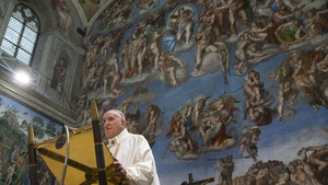 Pope Francis pictured celebrating mass inside the Sistine Chapel yesterday