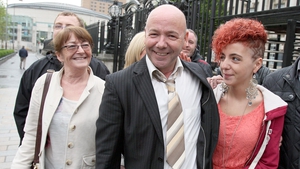 Liam Holden with family outside the Court of Appeal in Belfast after he had his conviction for murder quashed in 2012