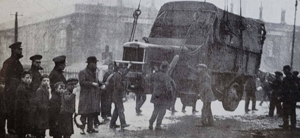 Century Ireland Issue 222 - Loading of a military lorry onto a boat at East Wall. Photo: Irish Life, January 27th 1922, p.13.