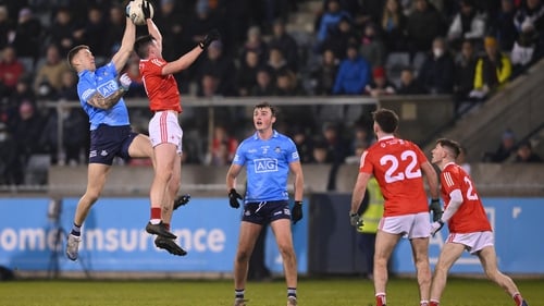 Dublin's Shane Carty and Louth's Liam Jackson leap for possession at Parnell Park