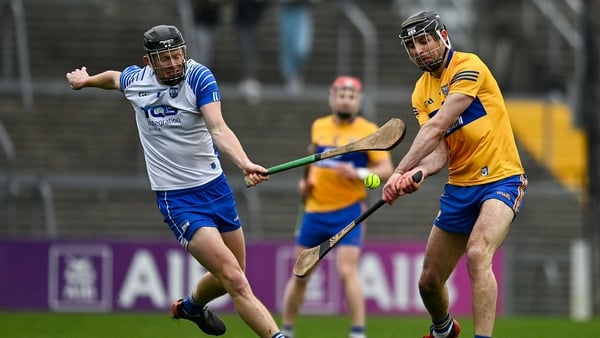 Cathal Malone of Clare in action against DJ Foran of Waterford