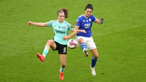 Maya Le Tissier of Brighton and Hove Albion battles for possession with Jess Sigsworth, who set up the Leicester City winner