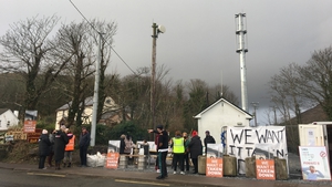Access to the mast in Inch is being blocked by local protesters who are calling for its removal