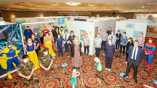 Staff at the vaccination centre in the Kilmore Hotel have replaced their scrubs with superhero costumes