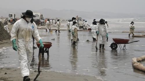 Cleaning teams have been working to remove the oil along the shorelines after it stained the beaches of the district area in Lima