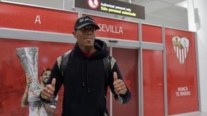 Martial poses at the airport upon his arrival in Seville