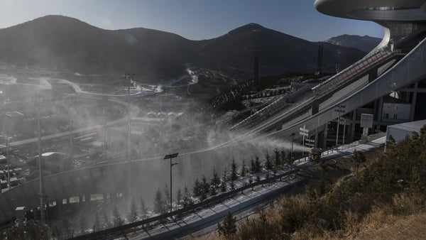 A snow machine in action at the National Ski Jumping Centre that will host events during the Beijing Winter Olympics