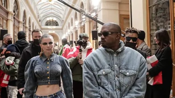 Kanye West and Julia Fox at the Kenzo menswear show (Lewis Joly/AP)