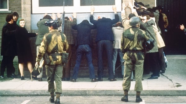 As the security situation spiralled out of control, the NI Civil Rights Association called for an end to the policy of imprisonment without trial. Here British troops search civilians on the day of the massacre (Pic: William L. Rukeyser)