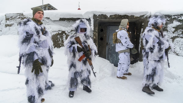 Ukrainian soldiers in winter camouflage seen during a military exercise