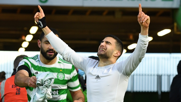 Abada of Celtic celebrates with teammate Cameron Carter-Vickers
