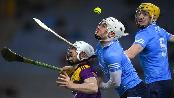 Oisín Foley competes for possession with Dublin duo Andrew Dunphy and Daire Gray