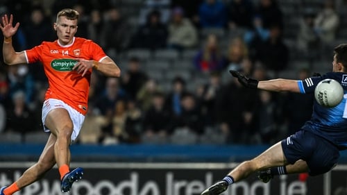 Rian O'Neill finishes past Evan Comerford for Armagh's first goal
