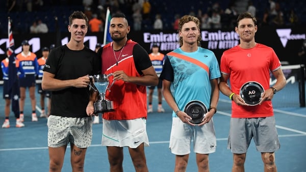 Thanasi Kokkinakis (L) and Nick Kyrgios (2nd from L) pictured after beating Matthew Ebden (R) and Max Purcell (2nd from right) in the Australia Open men's doubles final