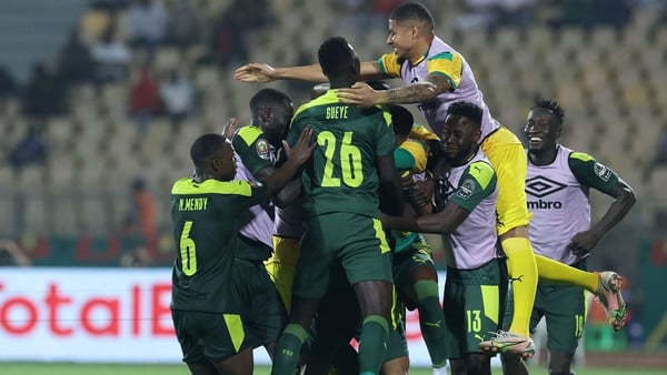 Senegal players celebrate at the Ahmadou Ahidjo Stadium in Yaounde