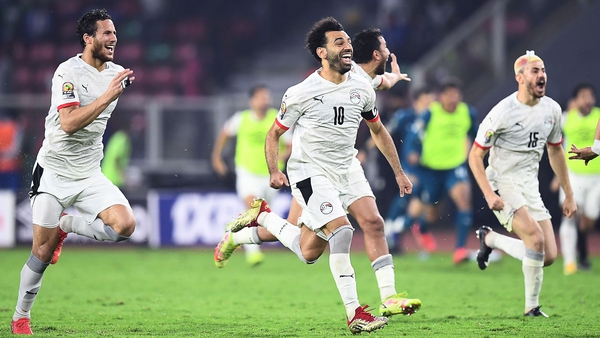 Mohamed Salah celebrates after the shootout victory