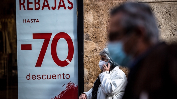 People wearing facemasks in Spain