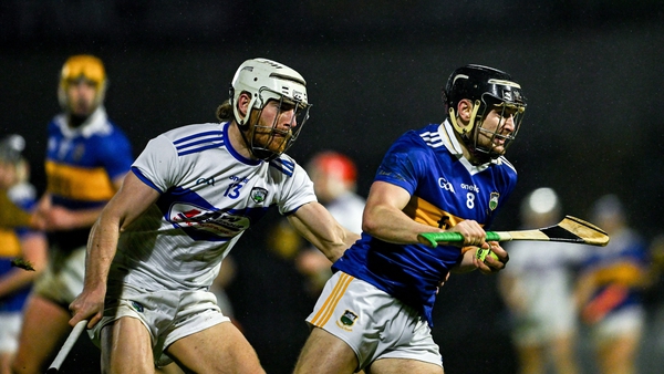 Tipperary's Séamus Kennedy bursts past Ben Conroy