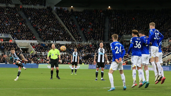 Kieran Trippier (L) scores Newcastle United's third goal