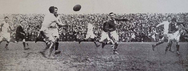 Action from the match between Ireland and England at Lansdowne Road in Dublin Photo: Irish Life, 17 February 1922. Full collection of Irish Life available in the National Library of Ireland.