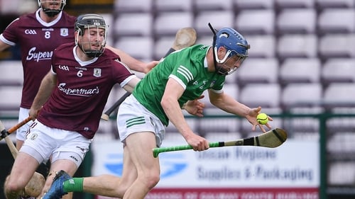Limerick's David Reidy gets away from Galway's Padraic Mannion in last year's league clash