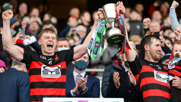 Ballygunner's Philip O'Mahony, left, and captain Barry Coughlan lift the All-Ireland club trophy