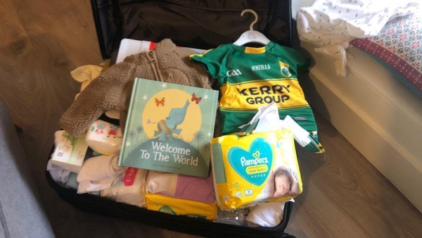 Baby Luke was born via surrogacy this morning and will travel home in a Kerry jersey