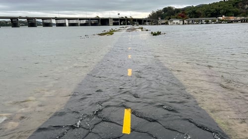 A section of the Sausalito/Mill Valley bike path covered in ocean water during the "King Tide" in Mill Valley, California earlier this month