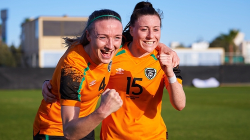 Louise Quinn (L) and Lucy Quinn celebrate Ireland's win.