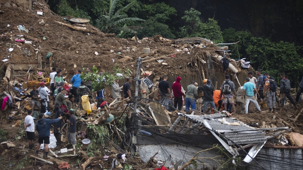 At least 94 people died in the landslides and flooding on Tuesday