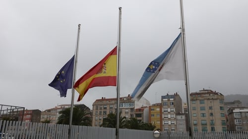 Flags fly at half-mast at the Port Authority in Marin, Pontevedra, Galicia, Spain, earlier this week