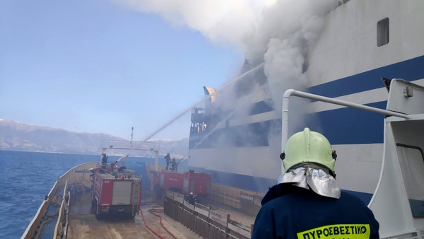 The Greek fire brigade said two men trapped in the ship's garage had been rescued