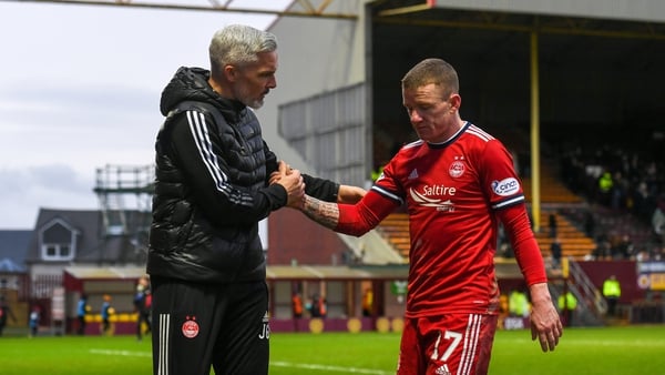 Aberdeen manager Jim Goodwin with former Ireland cap Jonny Hayes during the game