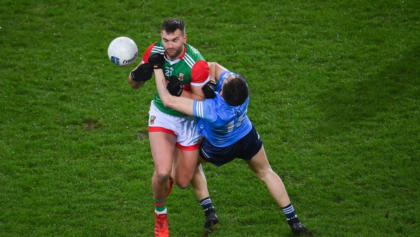 Aidan O'Shea blasts through Dublin's Mick Fitzsimons late in the game