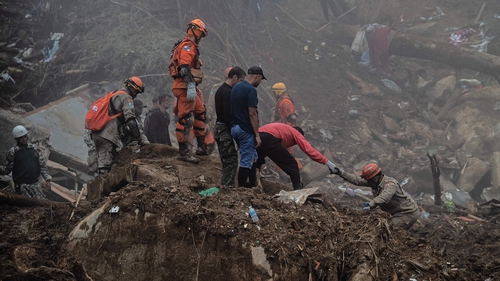 Rescuers worker search for victims in Petropolis