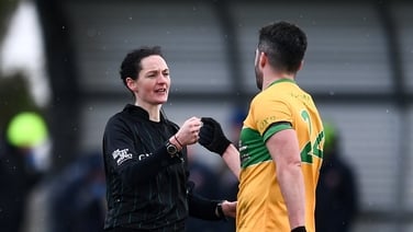 Maggie Farrelly reacts after making refereeing history