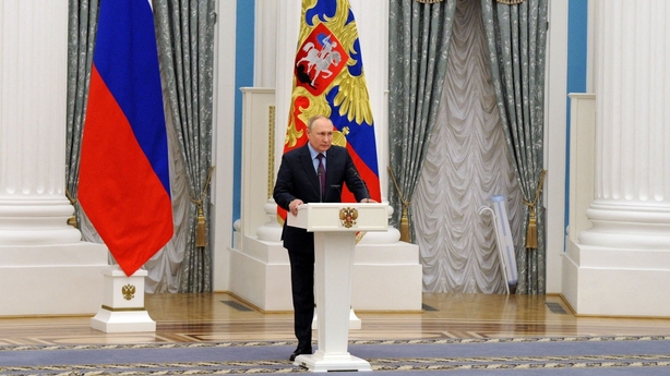 Vladimir Putin speaking to reporters in the Kremlin today
