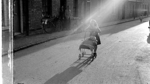 Nevill Johnson, Girl with pram, Dublin city (1952/1953)