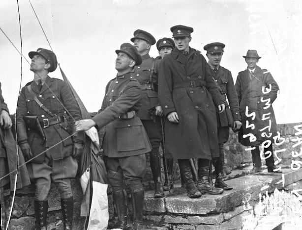 Century Ireland Issue 225 - General Sea´n Mac Eoin hoists flag over Custume Barracks, Athlone Photo: Photo: The Independent Newspapers (Ireland) Collection, courtesy of the National Library of Ireland