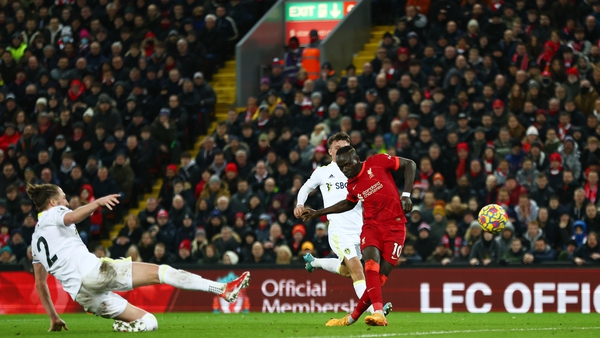 Sadio Mane tucks home Liverpool's fourth