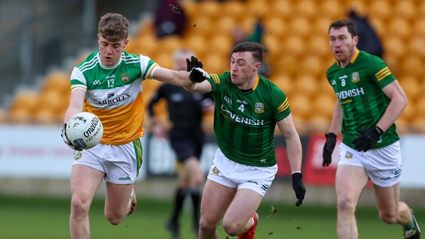 Jack Bryant of Offaly in action against Jordan Muldoon
