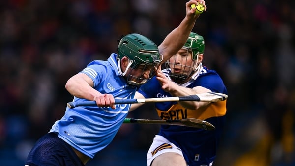 Dublin's Aidan Mellett breaks clear of the challenge of Brian McGrath