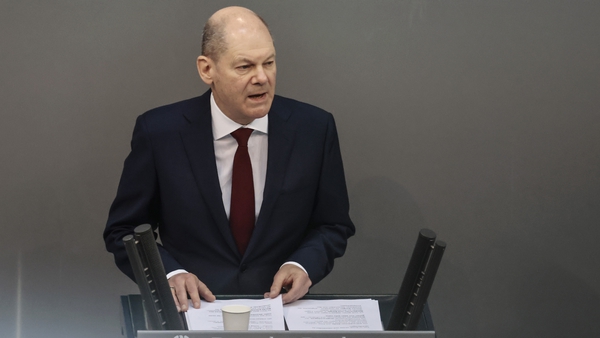 Olaf Scholz said more is needed to protect Germany's freedom and democracy
