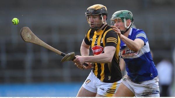 James Bergin of Kilkenny tries to evade the attention of tackled by Seán Downey