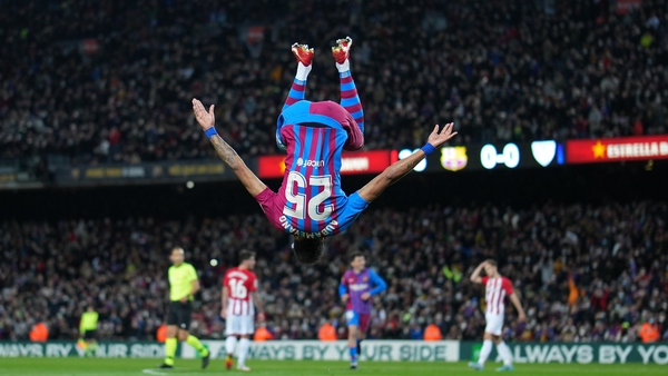Pierre-Emerick Aubameyang celebrates his first goal with a somersault.