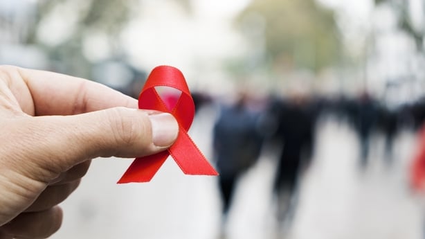 Closeup of a red awareness ribbon for the fight against AIDS
