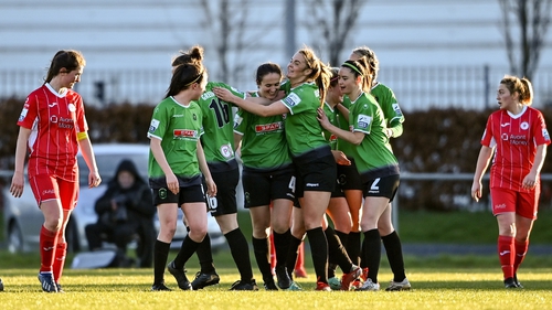 Peamount United players celebrate with Dora Gorman after scoring their opener