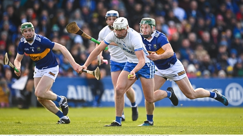 Neil Montgomery of Waterford is tackled by Cathal Barrett of Tipperary