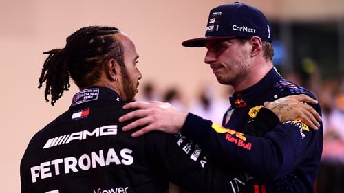 Max Verstappen (R) is congratulated by Lewis Hamilton after last December's race in Abu Dhabi.