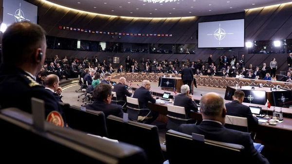 Defence ministers take part in a round table during a meeting over the Ukraine war at the NATO headquarters in Brussels